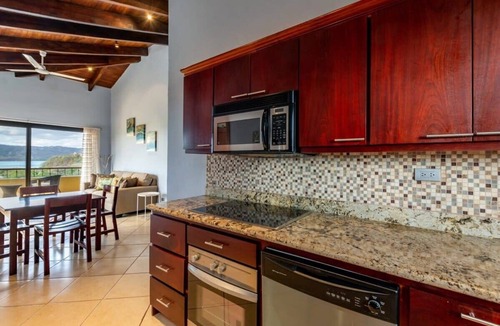 Playa Flamingo Condo | Chic Cliffside Condo w/Two Balconies Offering Spectacular Ocean & Mountain Views
