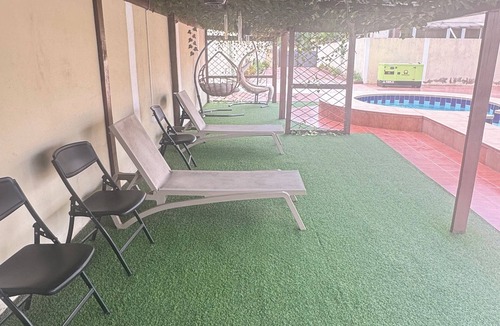 Dzorwulu Apartment | Poolside 2-bedroom apartment in beautiful Accra with AC for relaxing stays