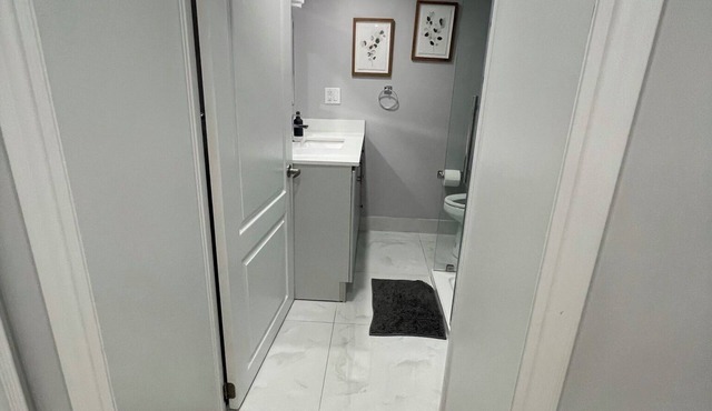 A Private Basement Studio Unit with King bed in Milton