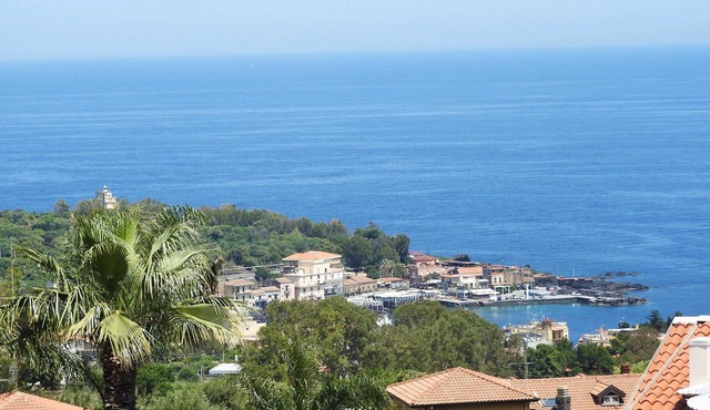 Attic overlooking the sea of the Cyclops in Vampolieri