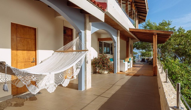Beach front villa surrounded by ocean views, steps from the beach in Playa Flamingo