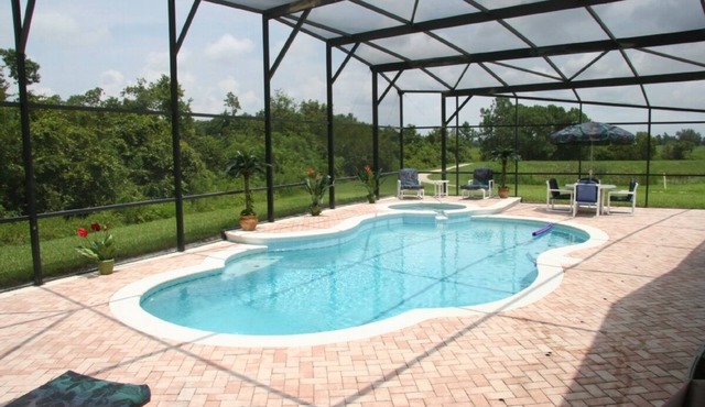 Beautiful 4BR/3 ba House-3miles Disney large pool/spa/XLdeck-Wheelchair friendly in Kissimmee