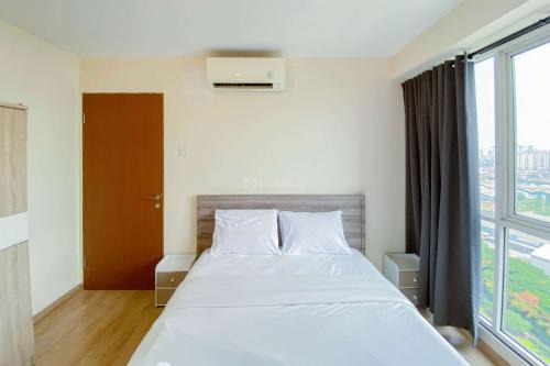 Cozy and Enjoy Living 2BR Tifolia Apartment By Travelio in Jakarta