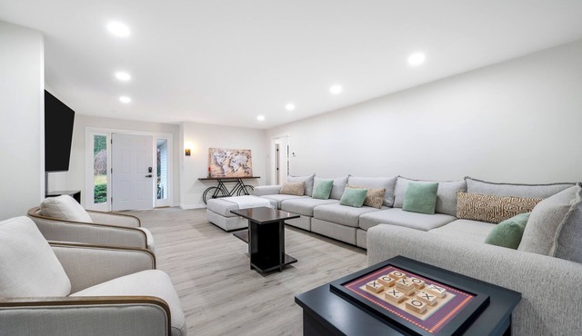 Features two living rooms, sauna, hot tub, and fire pit -over 4 acres of land. in Stroudsburg