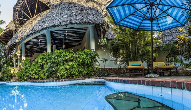 Large luxury beachside villa with a pool, guesthouse, cook, gardener, and maid in Diani Beach