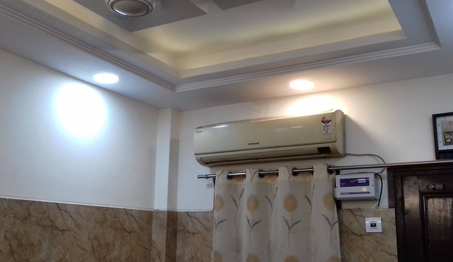 One bedroom apartment with attached kitchen and washroom along with fridge in New Delhi
