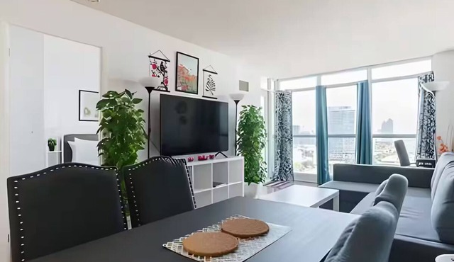 Steps to Everything: Prime Downtown Toronto 2BR/2BA with Included Parking