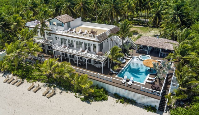Zen Exuma: Stunning Beachfront Villa w/NEW Rooftop Lounge, Spa, Cabana & Pool! in Moss Town