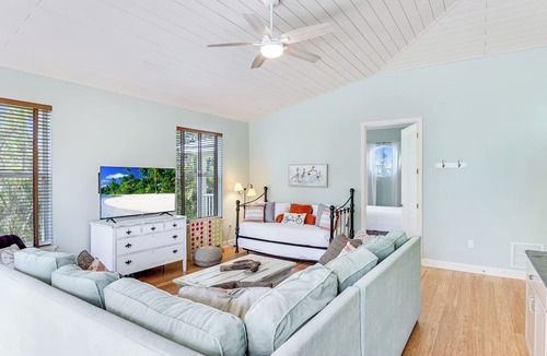 Holmes Beach House | Surfside AMI; backyard oasis steps to beach, heated pool, putting green,+gear!